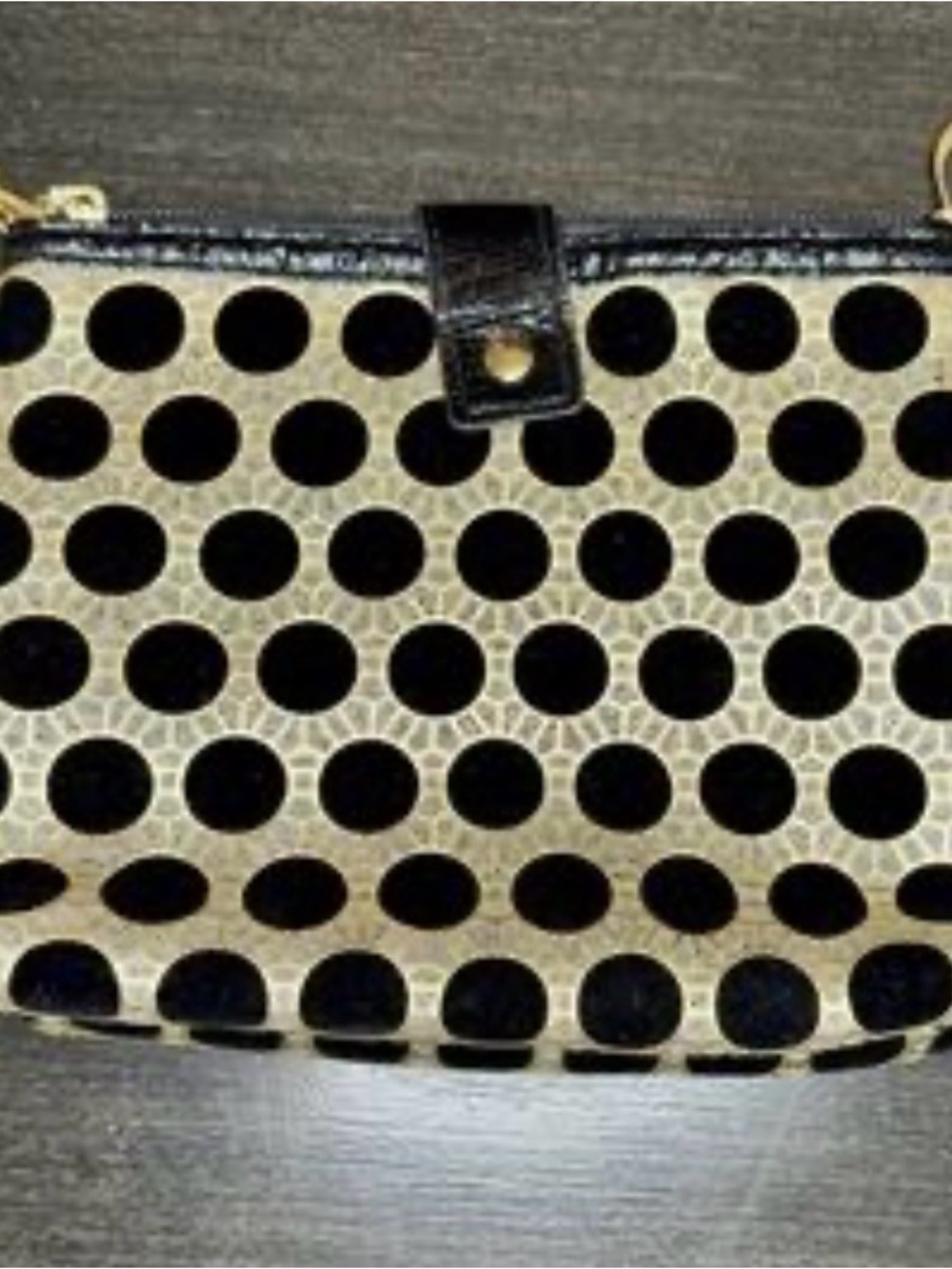 Limited edition Dior black and gold cosmetics bag with signature charms